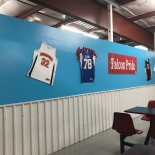 blue wall with sports stuff